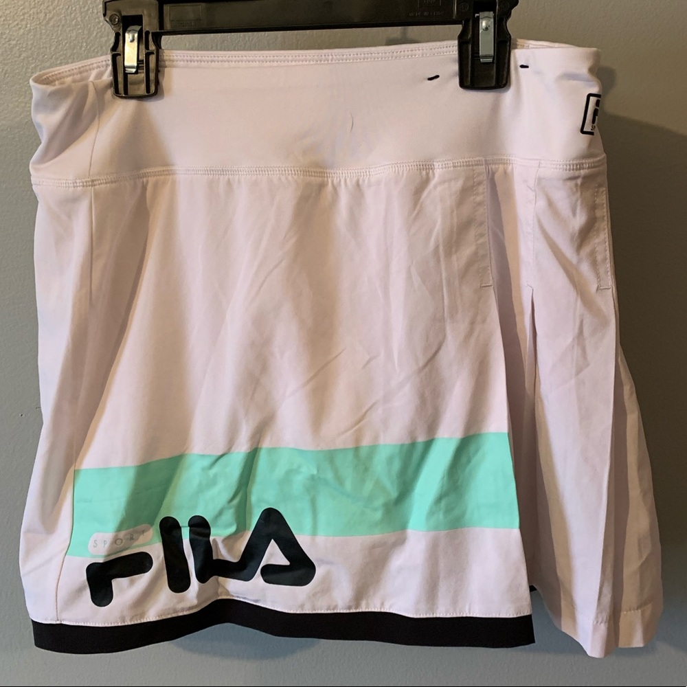 Fila golf/tennis skirt with built in spandex.